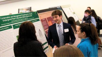 BERI Symposium - Student presents during poster session. (2)