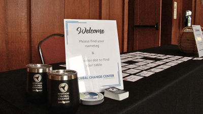 Welcome table with signage and name tags.